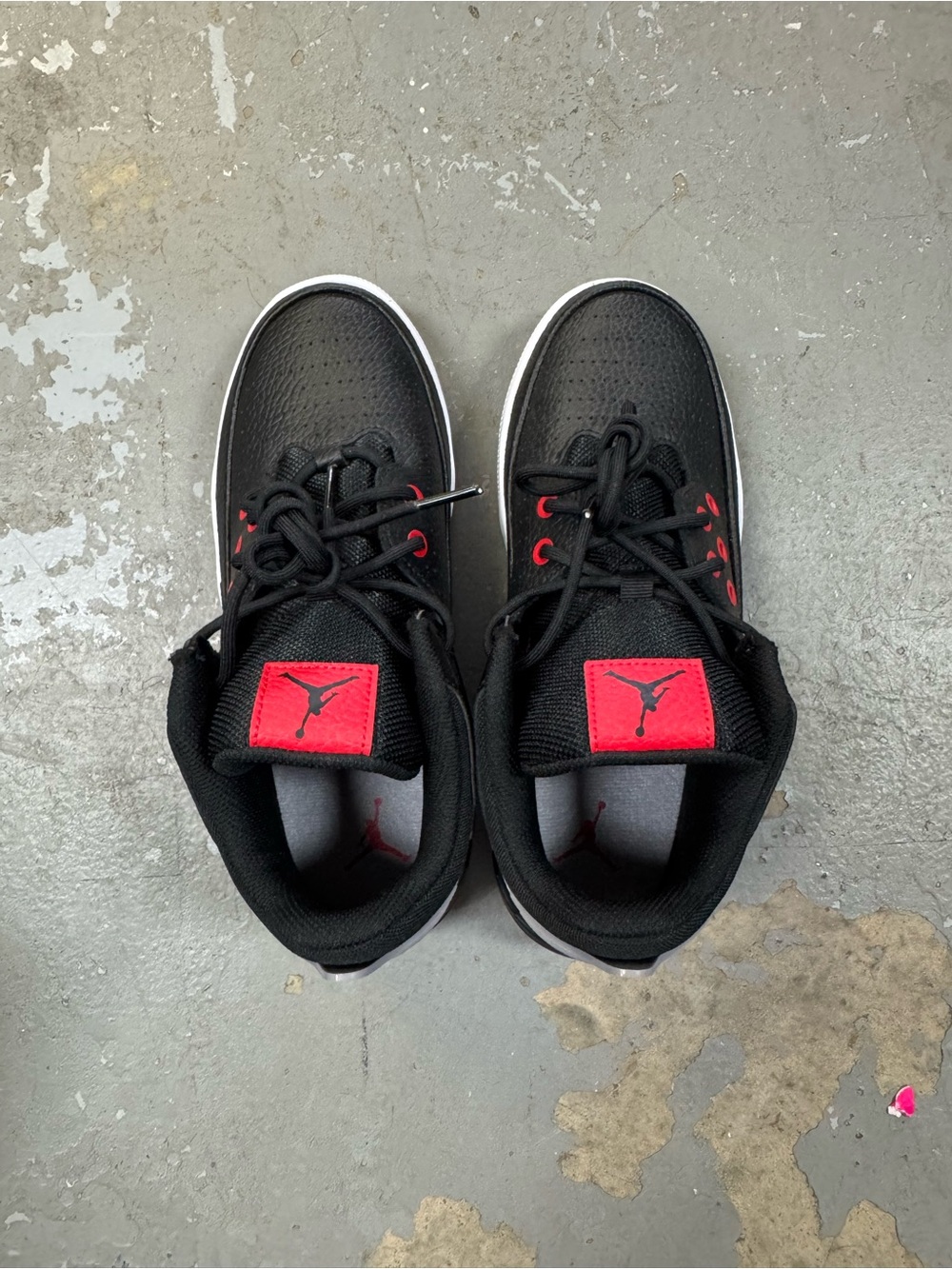 Jordan Kids Black Sneakers with Red Logo Accents